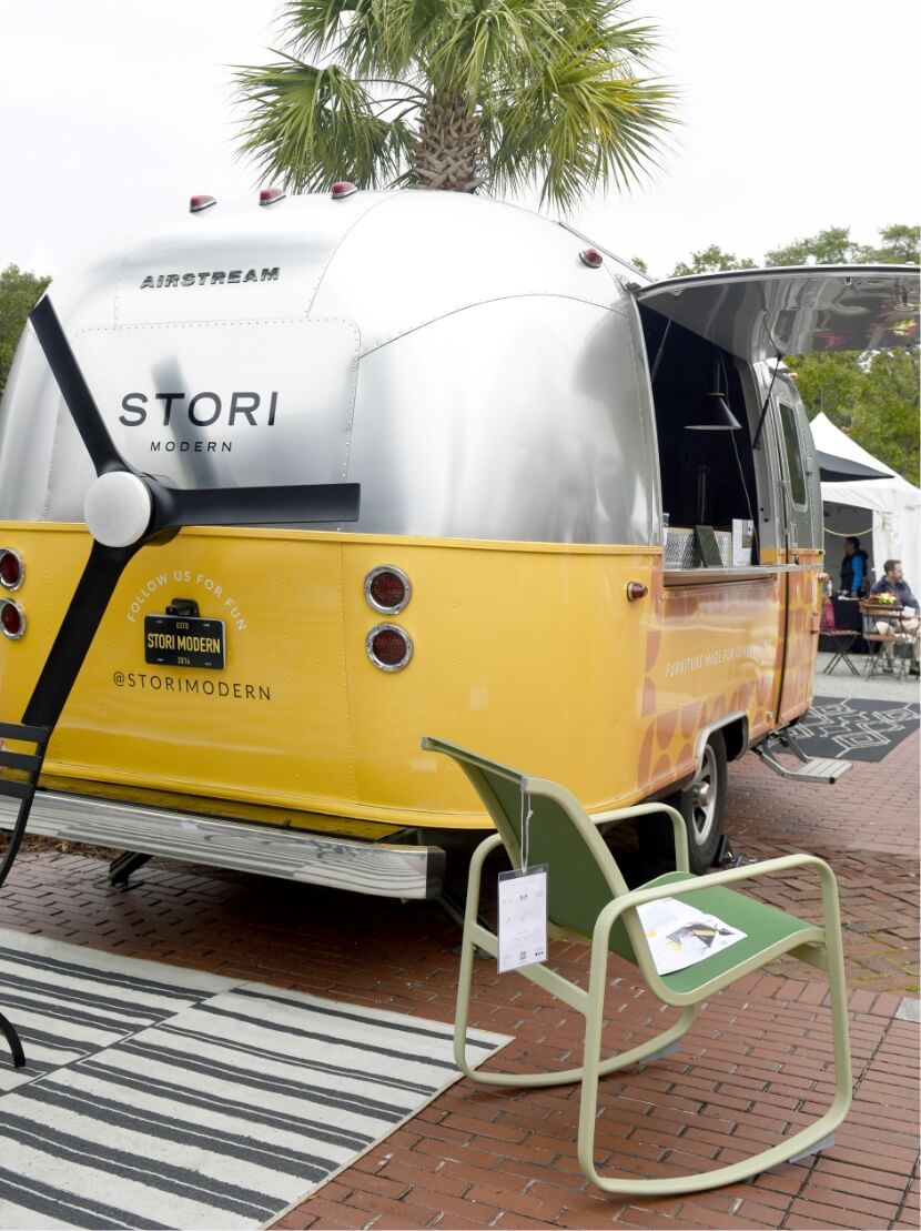 The Stori Modern Airstream with a Stori Modern rocker and a rug beside it