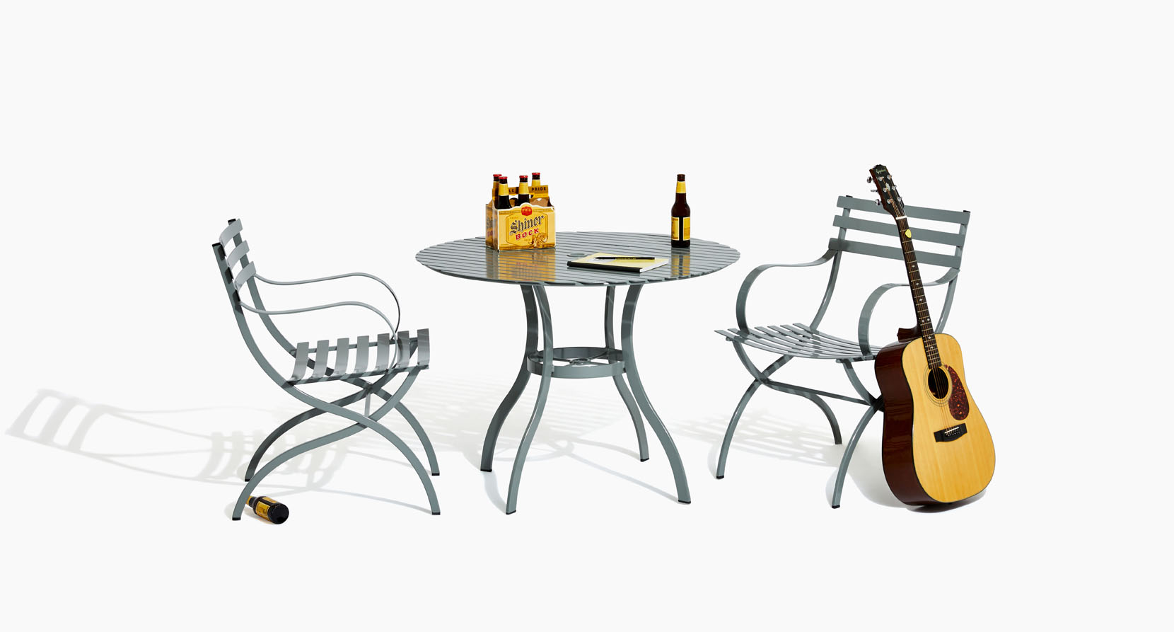 The Journal Collection Outdoor Dining Table and Side Chairs