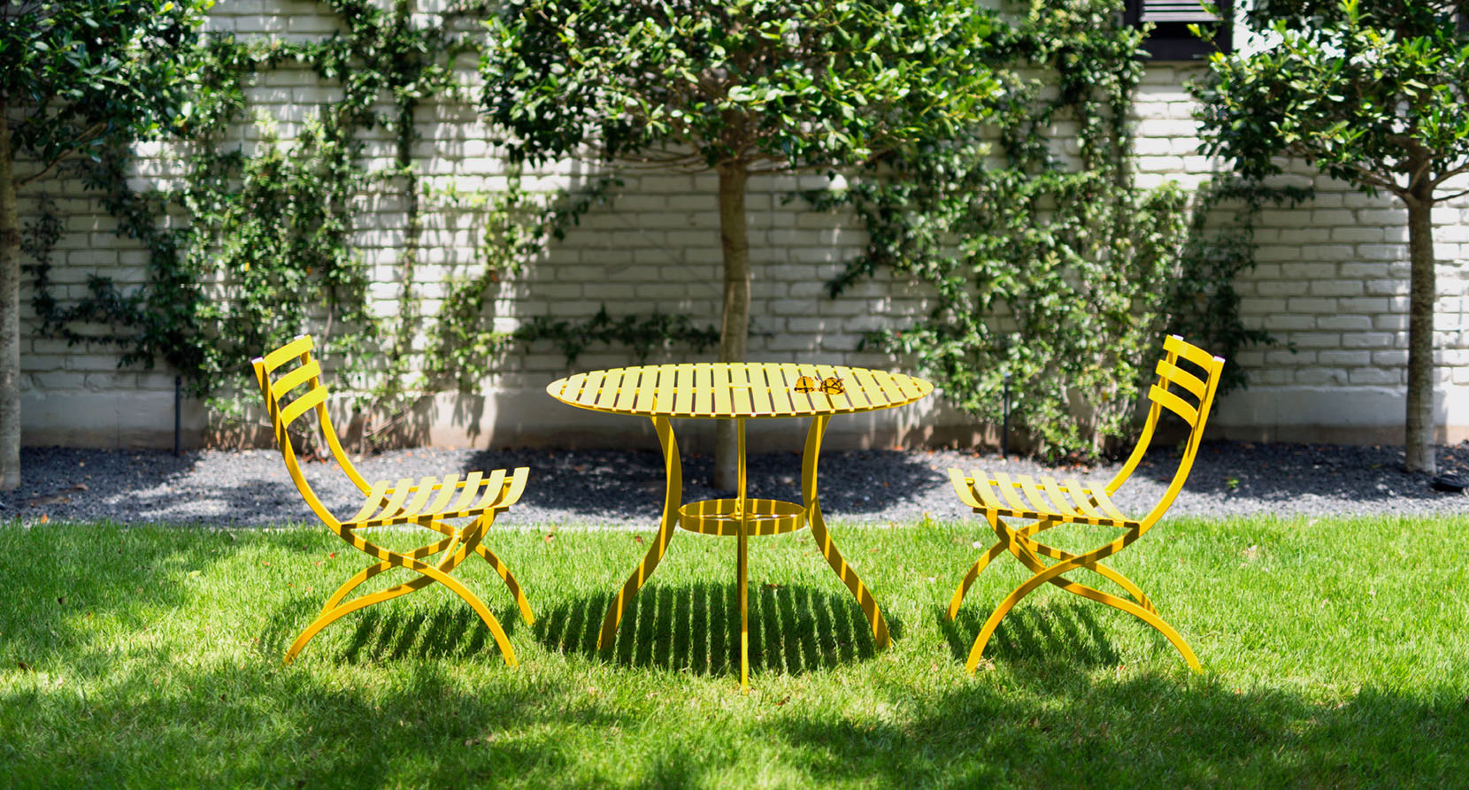 The Journal Collection Outdoor Dining Table and Side Chairs